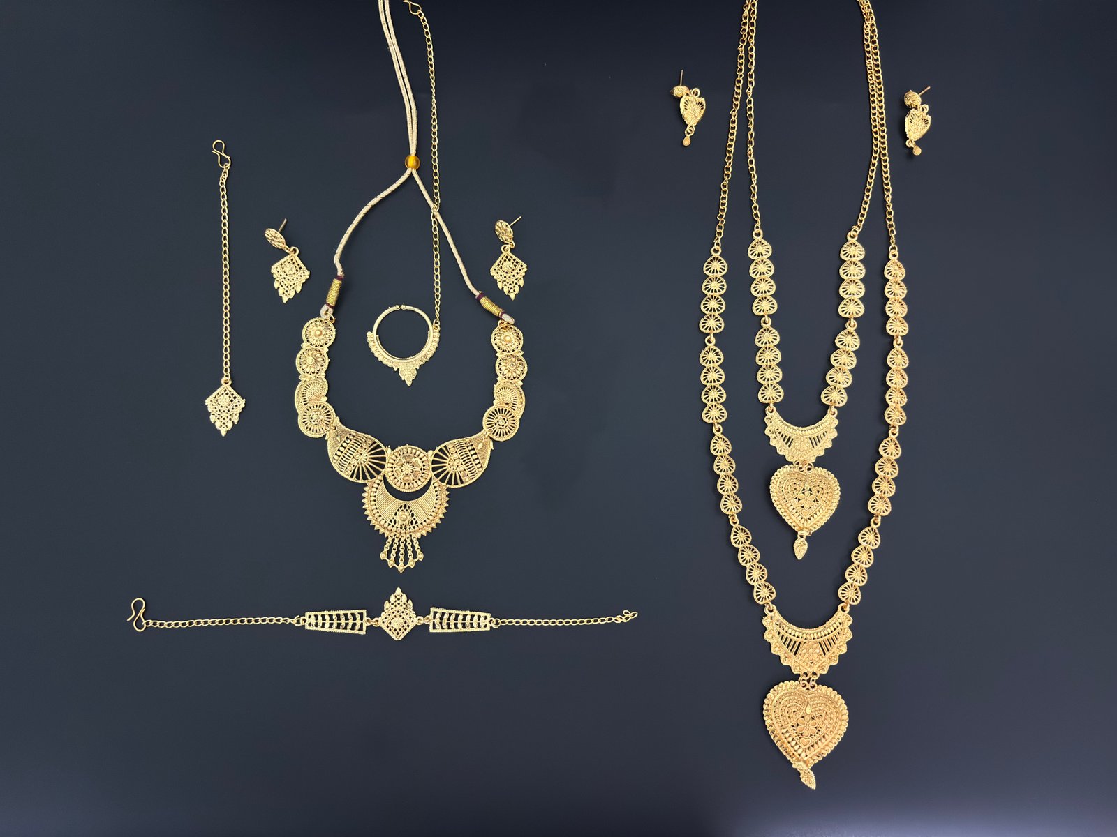 Royal Gold-Plated Bridal Combo Set – 2 Necklace Sets with Earrings & Bracelet