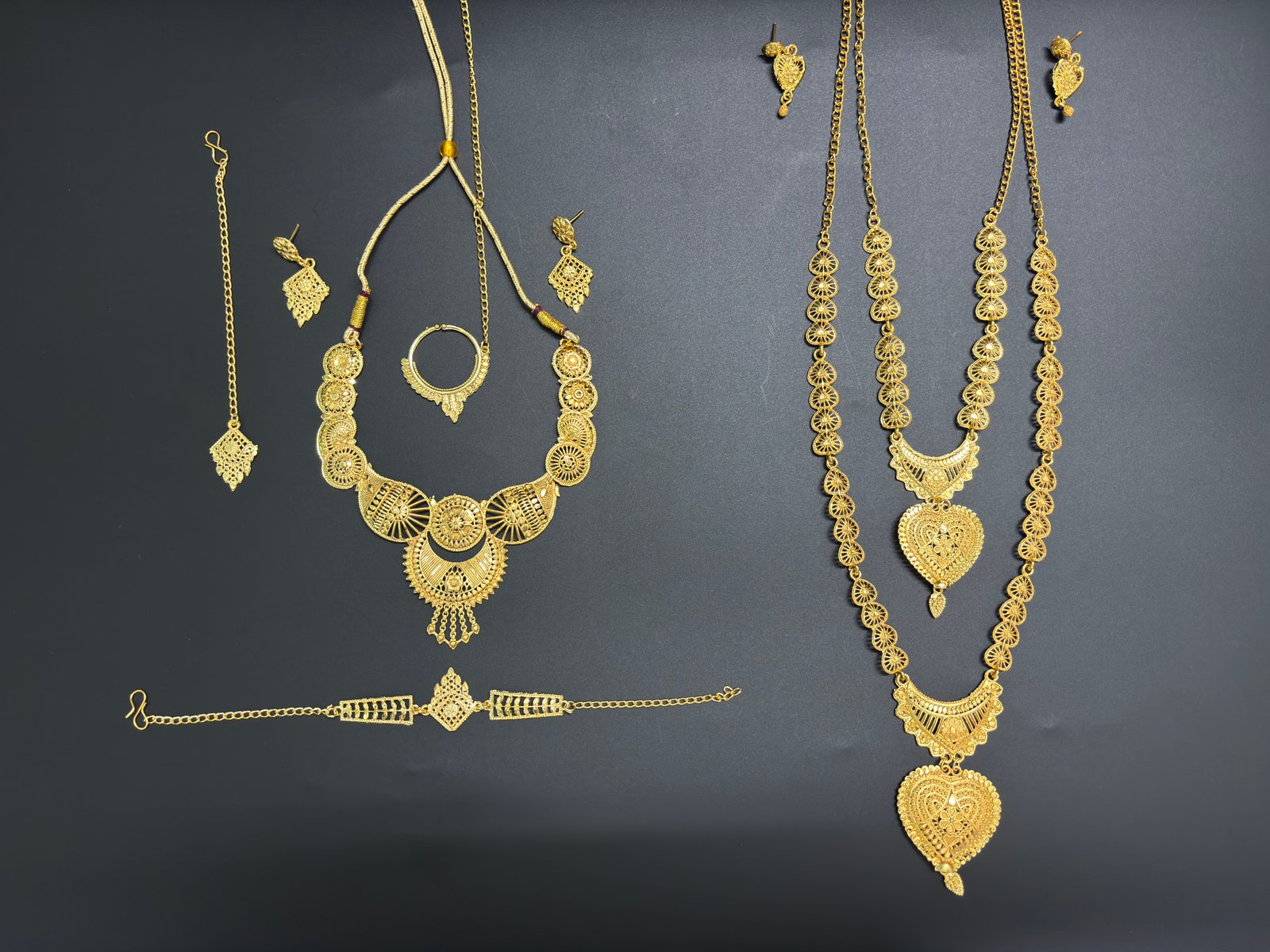 Royal Gold-Plated Bridal Combo Set – 2 Necklace Sets with Earrings & Bracelet