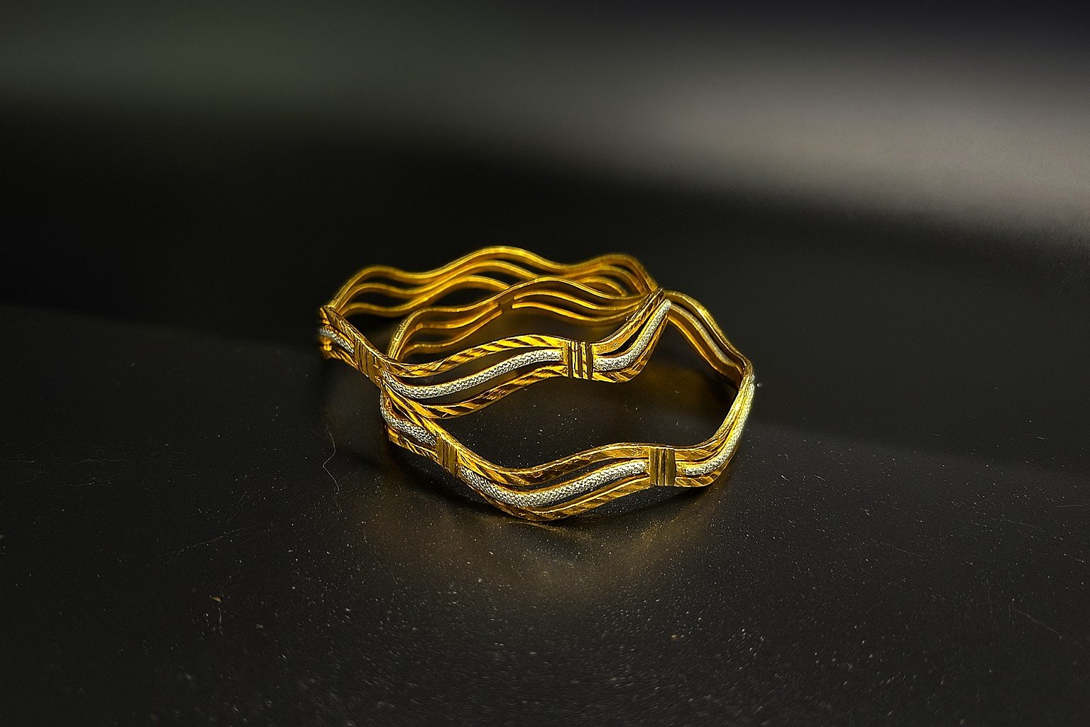 Bright Gold and Silver Wave Design Bangles