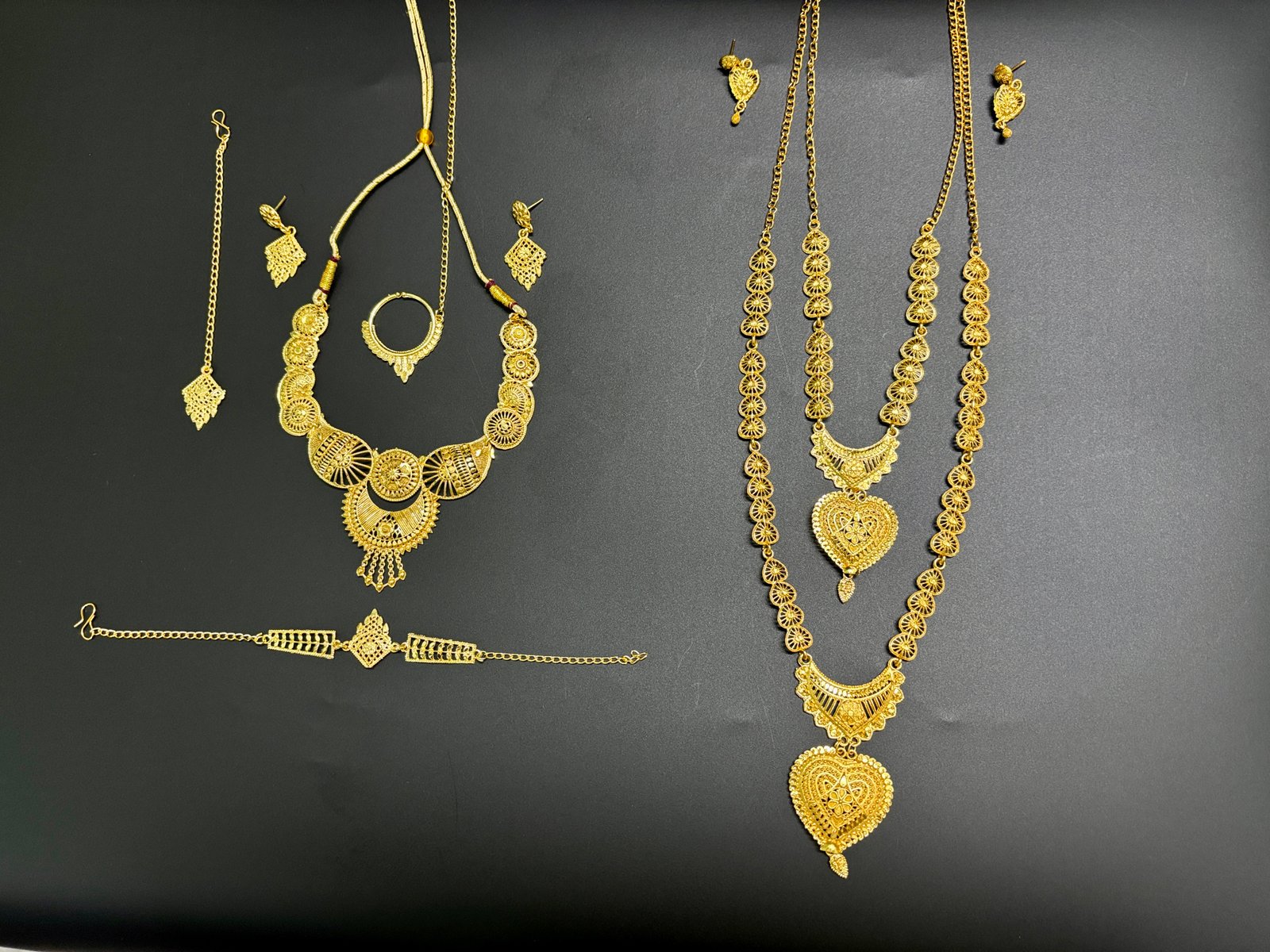 Royal Gold-Plated Bridal Combo Set – 2 Necklace Sets with Earrings & Bracelet