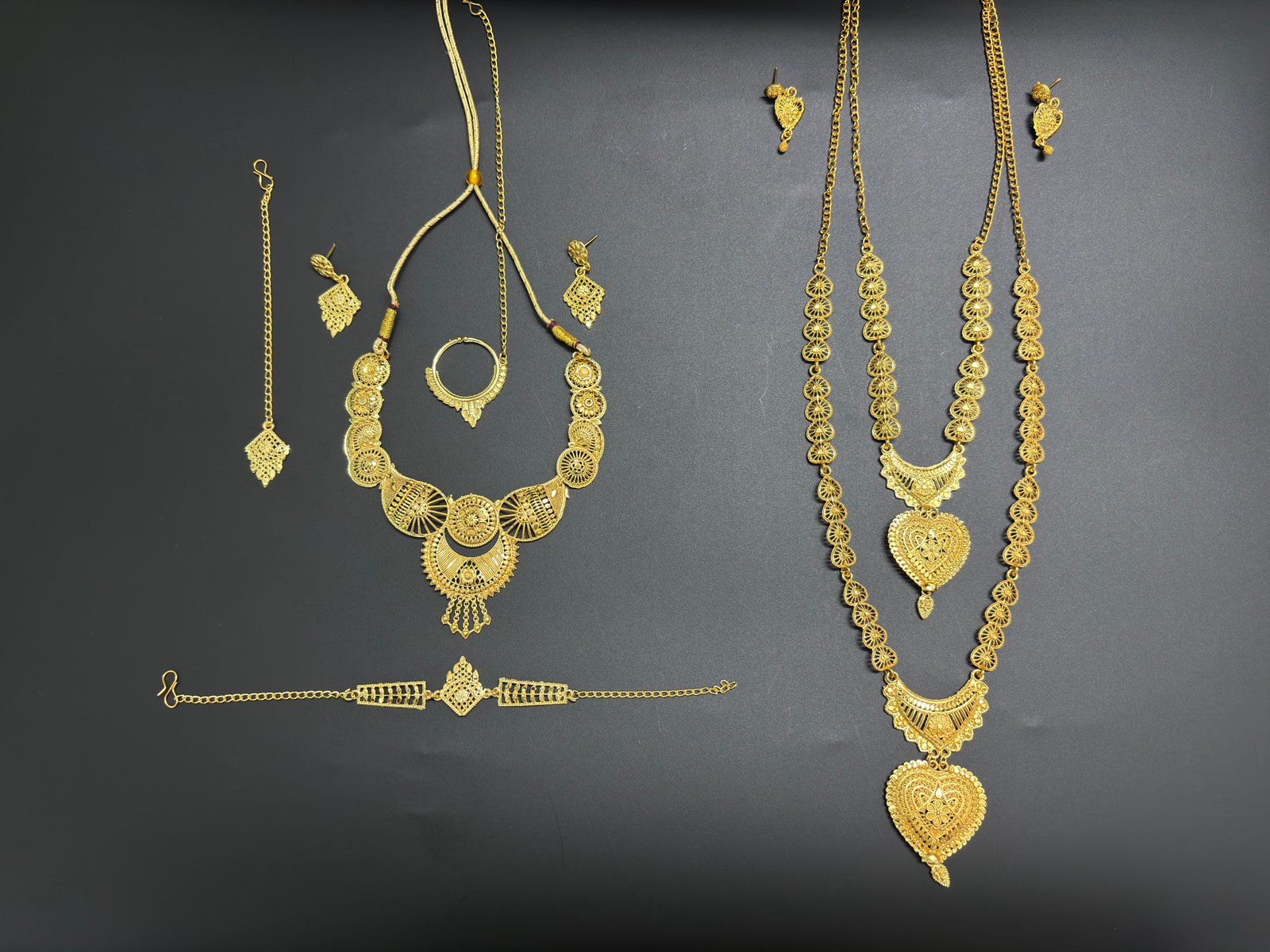 Royal Gold-Plated Bridal Combo Set – 2 Necklace Sets with Earrings & Bracelet